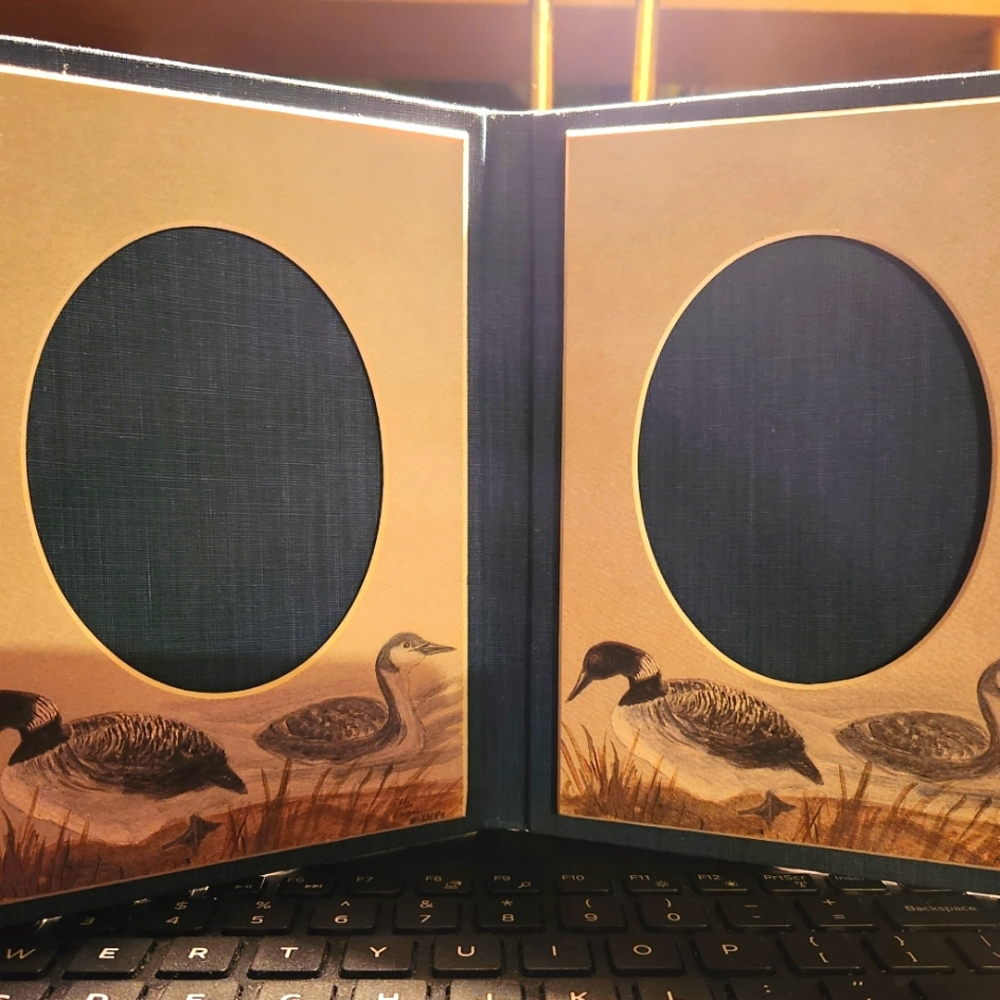 Blue double frame/ducks. Approx 3x4.5"